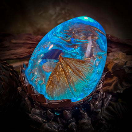 Side view of the Fire Dragon Hatchlight showcasing professional epoxy Shop quality.