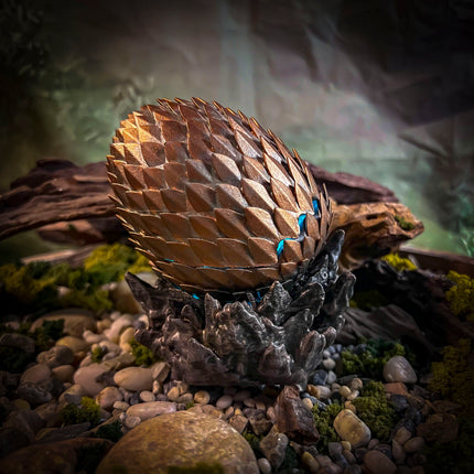 Close-up of a dragon resin lamp showing molten scales and burning eggshell textures.