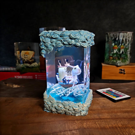 Decorative lamp with a cartoon character inside on a wooden surface