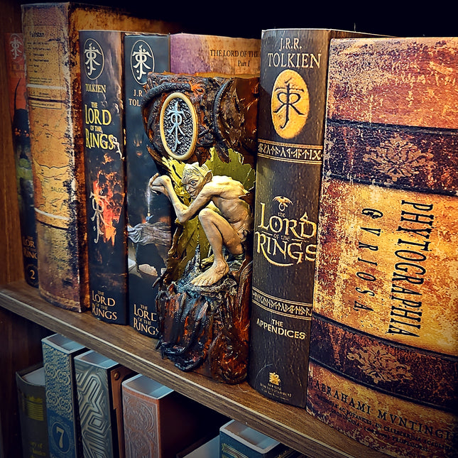 Lee-Area fantasy book nook featuring Gollum character between The Lord of the Rings books.