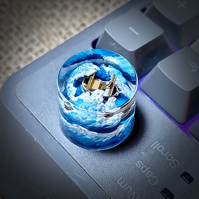 Collectible Going Merry artisan knob displayed as part of a One Piece keyboard collection