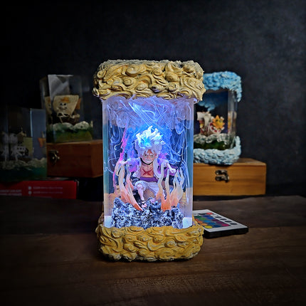 Decorative lamp with a figurine inside, surrounded by rocks and glowing elements, on a dark background.