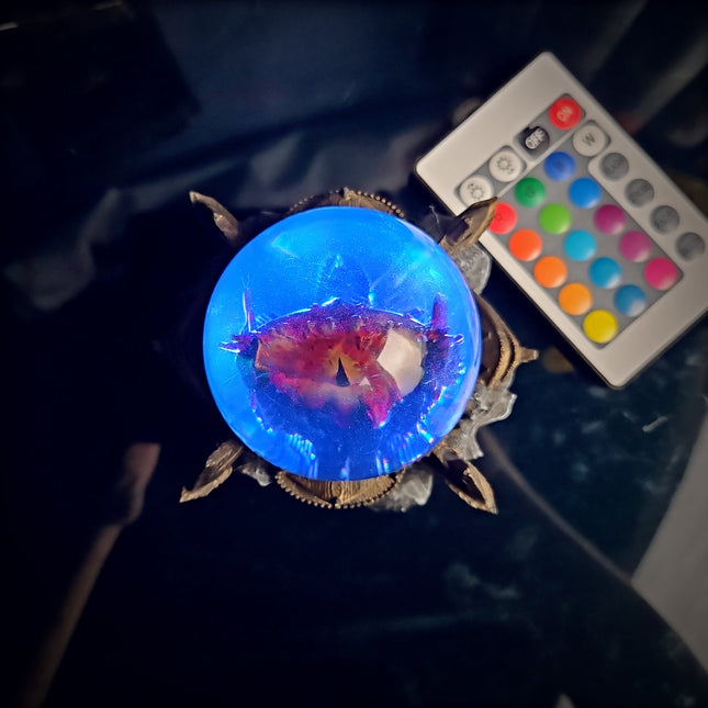 Close-up of Eye of Sauron burning inside a resin egg with detailed iris textures