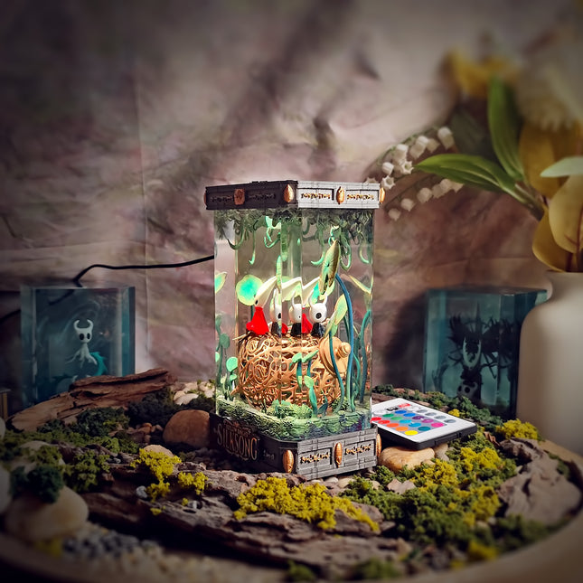 Close-up of hand-sculpted Hornet Silksong epoxy lamp