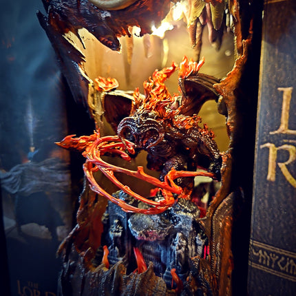 Lee-Area fantasy book nook featuring Balrog character between classic literature books.