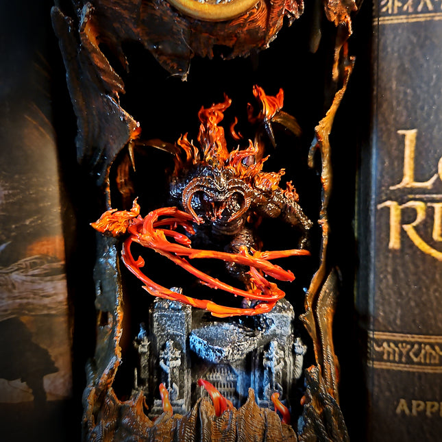 Close-up of Balrog bookshelf insert with translucent orange fire whip effect.
