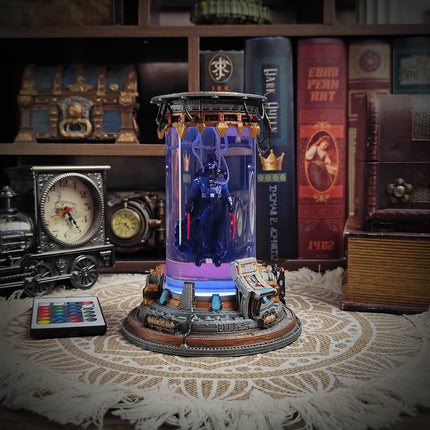 Decorative lamp with a figurine inside, surrounded by books and decorative items on a table.