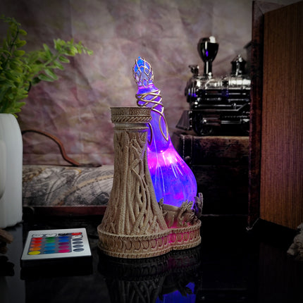 Decorative lamp with colorful light effects on a table