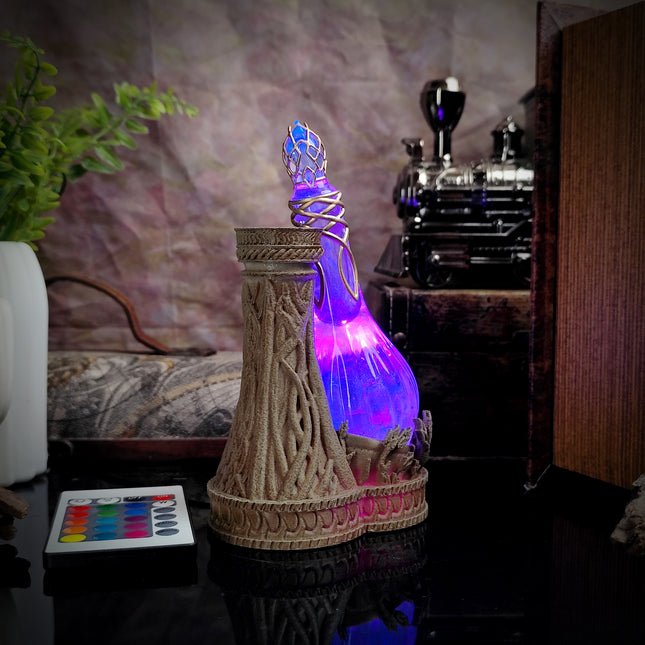 Decorative lamp with colorful light effects on a table
