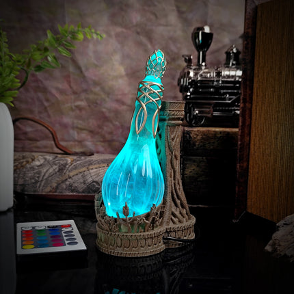 Decorative lamp with blue light on a stand in a room setting