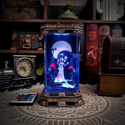 Decorative lamp with animated characters under a moonlit sky, surrounded by vintage items.