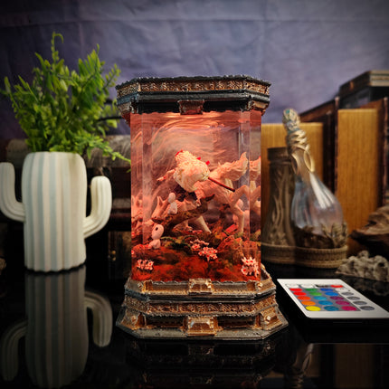 Decorative lamp with intricate design and colorful light effects on a reflective surface.